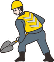 スコップを持った道路工事作業員